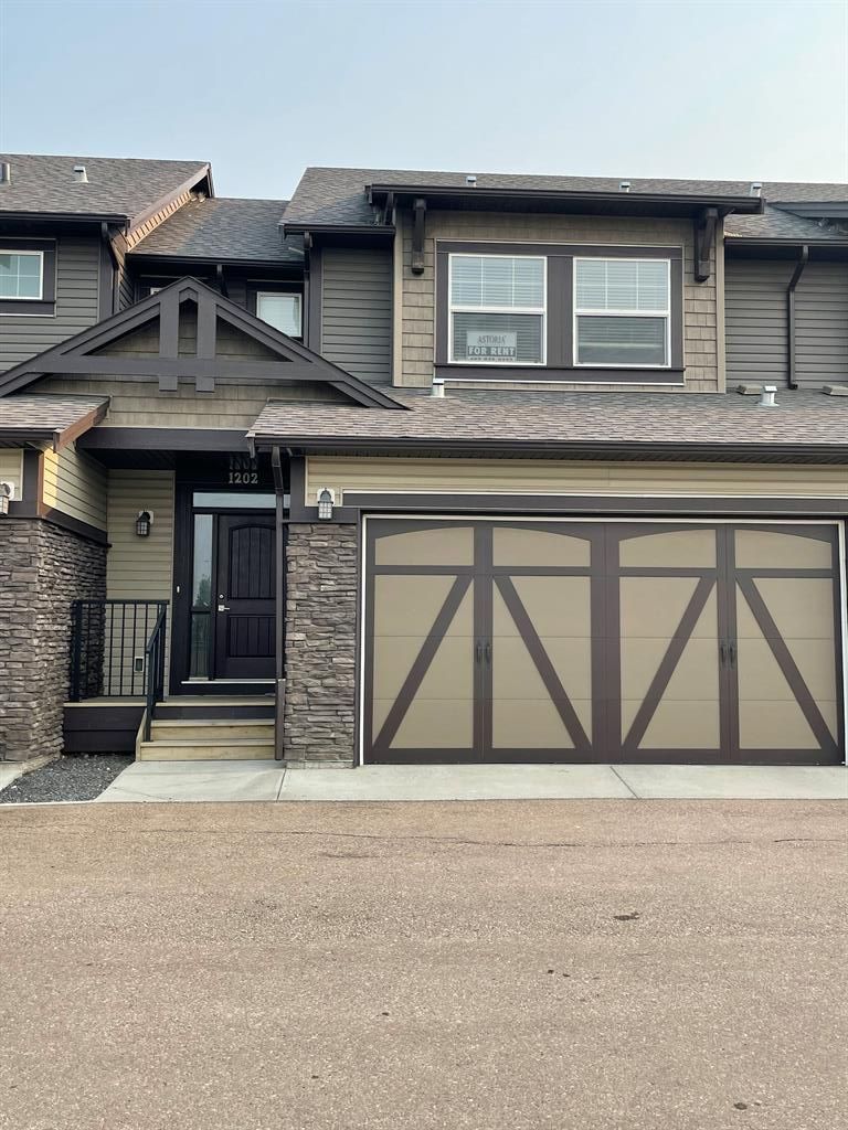 Main Photo: 110 Coopers Common SW: Airdrie Row/Townhouse for sale : MLS®# A2055933