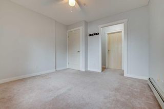 Photo 11: 117 33 Arbour Grove Close NW in Calgary: Arbour Lake Apartment for sale : MLS®# A2128544