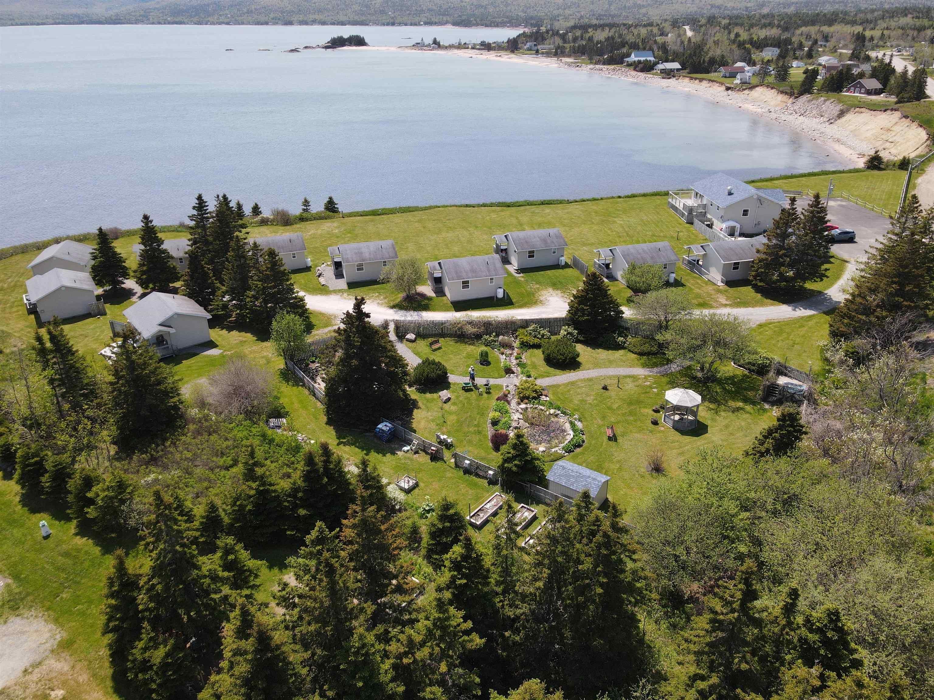 Main Photo: 36083 Cabot Trail Highway in Ingonish: 209-Victoria County / Baddeck Multi-Family for sale (Cape Breton)  : MLS®# 202312326