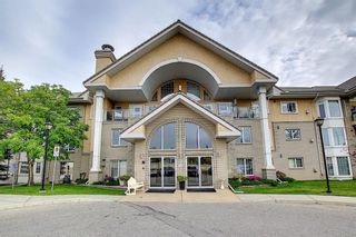 Photo 1: 123 728 Country Hills Road NW in Calgary: Country Hills Apartment for sale : MLS®# A1040222
