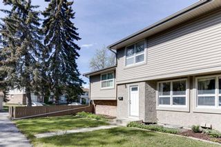 Photo 2: 56 123 Queensland Drive SE in Calgary: Queensland Row/Townhouse for sale : MLS®# A1228124