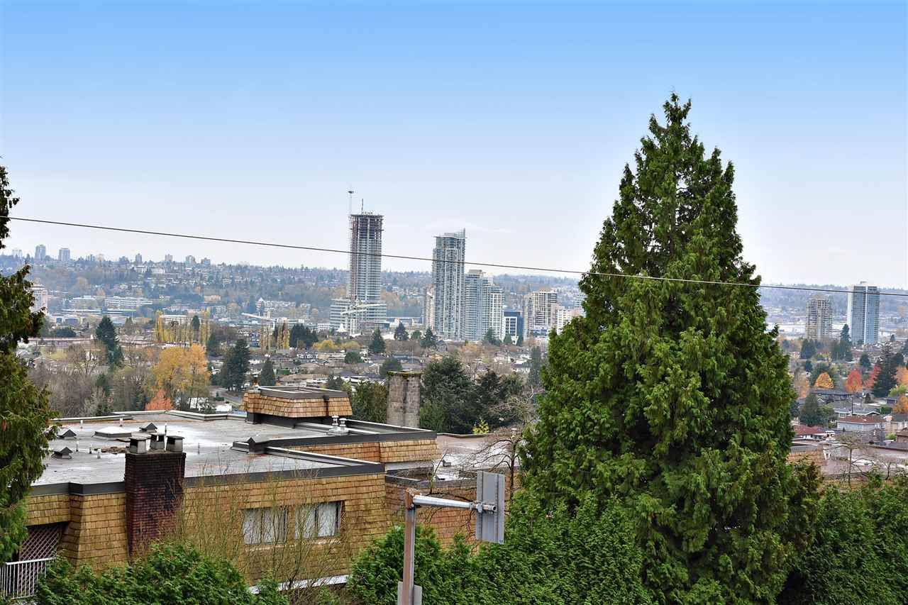 Main Photo: 210 5450 EMPIRE Drive in Burnaby: Capitol Hill BN Condo for sale in "EMPIRE PLACE" (Burnaby North)  : MLS®# R2131500