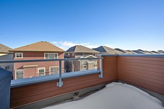 Photo 37: 142 Shawnee Common SW in Calgary: Shawnee Slopes Row/Townhouse for sale : MLS®# A1237424