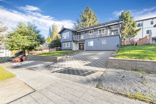 Photo 1: 7838 SUNCREST Drive in Surrey: East Newton House for sale : MLS®# R2871105