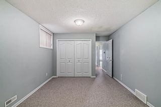 Photo 35: 8 220 Bow Ridge Court: Cochrane Semi Detached (Half Duplex) for sale : MLS®# A2026724