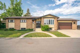 Photo 1: 44 Woodbrook Road SW in Calgary: Woodbine Detached for sale : MLS®# A2063185