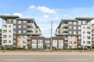 Photo 1: A404 20834 80 Avenue in Langley: Willoughby Heights Condo for sale in "Alexander Square" : MLS®# R2871254