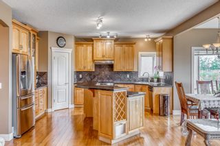 Photo 5: 42 Springborough Green SW in Calgary: Springbank Hill Detached for sale : MLS®# A1225017