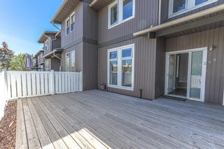 Photo 1: 209 5340 17 Avenue SW in Calgary: Westgate Row/Townhouse for sale : MLS®# A2049616