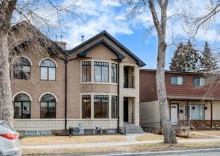 Photo 1: 2415 7 Avenue NW in Calgary: West Hillhurst Semi Detached (Half Duplex) for sale : MLS®# A2043161