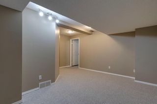 Photo 37: 8 156 Canoe Drive SW: Airdrie Row/Townhouse for sale : MLS®# A1205675