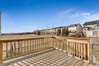 Photo 1: 561 Panamount Boulevard NW in Calgary: Panorama Hills Semi Detached for sale : MLS®# A1154675