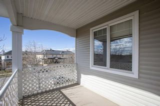 Photo 32: 1205 8000 Wentworth Drive SW in Calgary: West Springs Row/Townhouse for sale : MLS®# A1100584