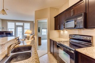 Photo 6: 407 1 Crystal Green Lane: Okotoks Apartment for sale : MLS®# A1156936