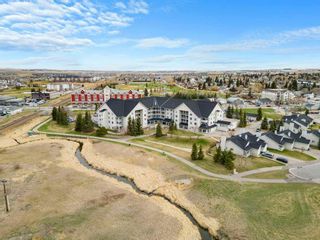 Photo 25: 308 305 1 Avenue NW: Airdrie Apartment for sale : MLS®# A2126591