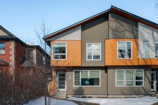 Main Photo: 832 22 Avenue NW in Calgary: Mount Pleasant Semi Detached (Half Duplex) for sale : MLS®# A2029654