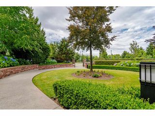 Photo 35: 174 2450 161A Street in Surrey: Grandview Surrey Townhouse for sale in "THE GLENMORE" (South Surrey White Rock)  : MLS®# R2477912