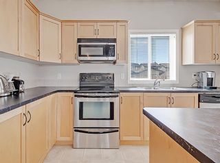 Photo 4: 425 Luxstone Place SW: Airdrie Detached for sale : MLS®# A1202994