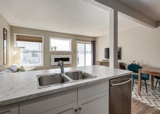 Photo 5: 313 Country Village Cape NE in Calgary: Country Hills Village Row/Townhouse for sale : MLS®# A1203665