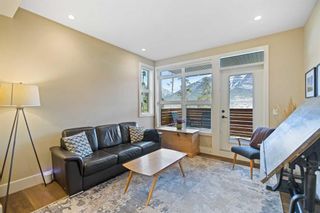 Photo 3: 205 Riva Heights: Canmore Row/Townhouse for sale : MLS®# A2092634