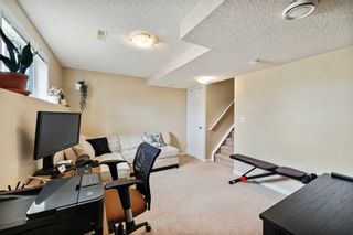 Photo 25: 127 Everhollow Heights SW in Calgary: Evergreen Row/Townhouse for sale : MLS®# A2127215
