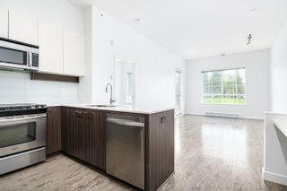 Photo 1: 410 555 FOSTER Avenue in Coquitlam: Coquitlam West Condo for sale in "FOSTER BY MOSAIC" : MLS®# R2694592