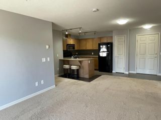 Photo 5: 3207 92 Crystal Shores Road: Okotoks Apartment for sale : MLS®# A1204476