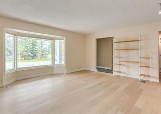 Photo 6: 943 Parkwood Way SE in Calgary: Parkland Detached for sale : MLS®# A1234711