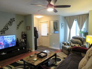Photo 4: 204 2445 Kingsland Road SE: Airdrie Row/Townhouse for sale : MLS®# A1229840