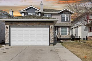 Photo 1: 66 Springbank Crescent SW in Calgary: Springbank Hill Detached for sale : MLS®# A1214241