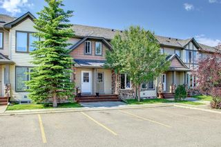 Photo 2: 104 2445 Kingsland Road SE: Airdrie Row/Townhouse for sale : MLS®# A1240825