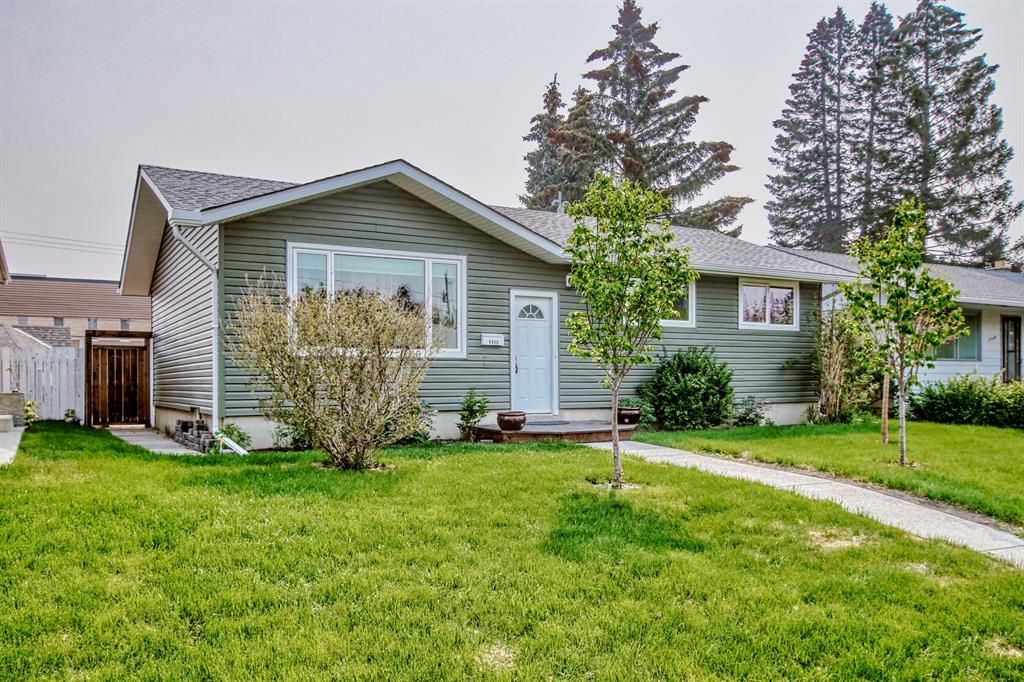 Main Photo: 9960 Warren Road SE in Calgary: Willow Park Detached for sale : MLS®# A2050383
