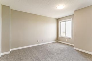 Photo 25: 20 Eversyde Park SW in Calgary: Evergreen Row/Townhouse for sale : MLS®# A1213117