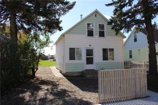 Photo 1: 223 Highway Avenue: Picture Butte Detached for sale : MLS®# A2120437