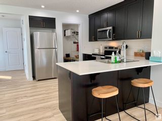 Photo 2: 1303 ERKER Crescent in Edmonton: Zone 57 House Half Duplex for sale : MLS®# E4376761