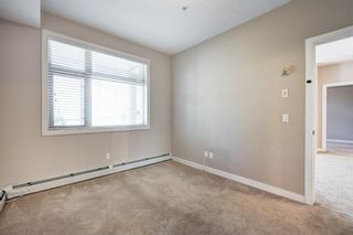 Photo 19: 124 35 Aspenmont Heights SW in Calgary: Aspen Woods Apartment for sale : MLS®# A1232326