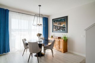 Photo 4: 216 Rowmont Boulevard NW in Calgary: C-483 Semi Detached (Half Duplex) for sale : MLS®# A2031674