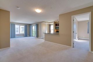 Photo 8: 9302 403 MACKENZIE Way SW: Airdrie Apartment for sale : MLS®# A1032027