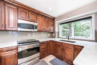 Photo 7: 19 Sunmount Court SE in Calgary: Sundance Detached for sale : MLS®# A2130056