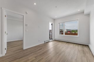Photo 12: 411 238 Sage Valley Common NW in Calgary: Sage Hill Apartment for sale : MLS®# A2054468