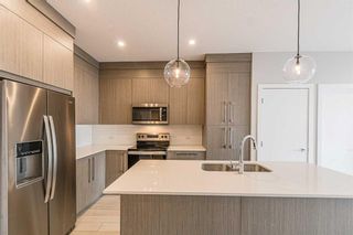 Photo 12: 2111 681 Savanna Boulevard NE in Calgary: Saddle Ridge Apartment for sale : MLS®# A2142854