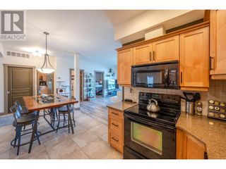 Photo 10: 873 FORESTBROOK Drive Unit# 102 in Penticton: House for sale : MLS®# 10309995