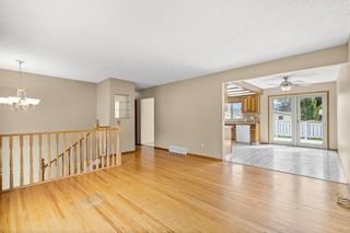 Photo 7: 306 Whitney Crescent SE in Calgary: Willow Park Detached for sale : MLS®# A1245173