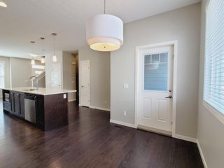 Photo 12: 106 Panatella Walk NW in Calgary: Panorama Hills Row/Townhouse for sale : MLS®# A1206869