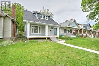 Photo 2: 1081 BRUCE AVENUE in Windsor: House for sale : MLS®# 23009684