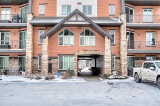 Photo 2: 3206 15 Sunset Square: Cochrane Apartment for sale : MLS®# A2031670