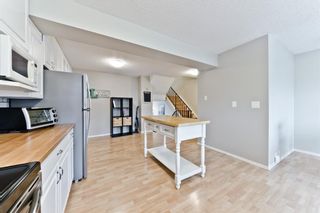 Photo 11: #37 10 Point Drive NW in Calgary: Point McKay Row/Townhouse for sale : MLS®# A1074626