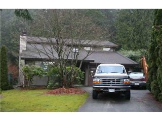 Photo 1: 1712 HEATHER Place in Port Moody: Mountain Meadows House for sale : MLS®# V991513