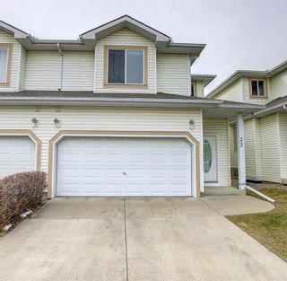 Photo 1: 32 35 Patterson Hill SW in Calgary: Patterson Semi Detached for sale : MLS®# A1206771