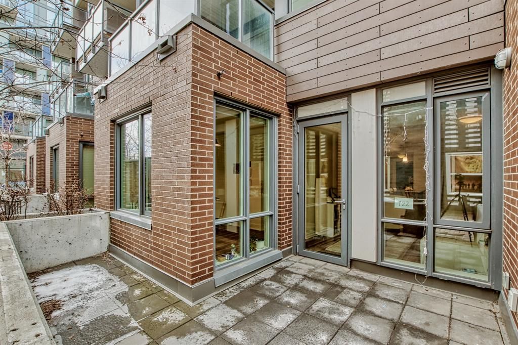 Main Photo: 122 619 Confluence Way SE in Calgary: Downtown East Village Apartment for sale : MLS®# A2044567